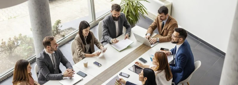 birds eye view of coworkers having a meeting