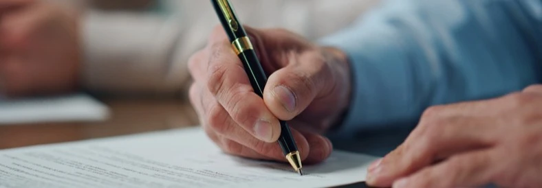 A person signing a document