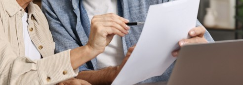 A couple looking at documents together