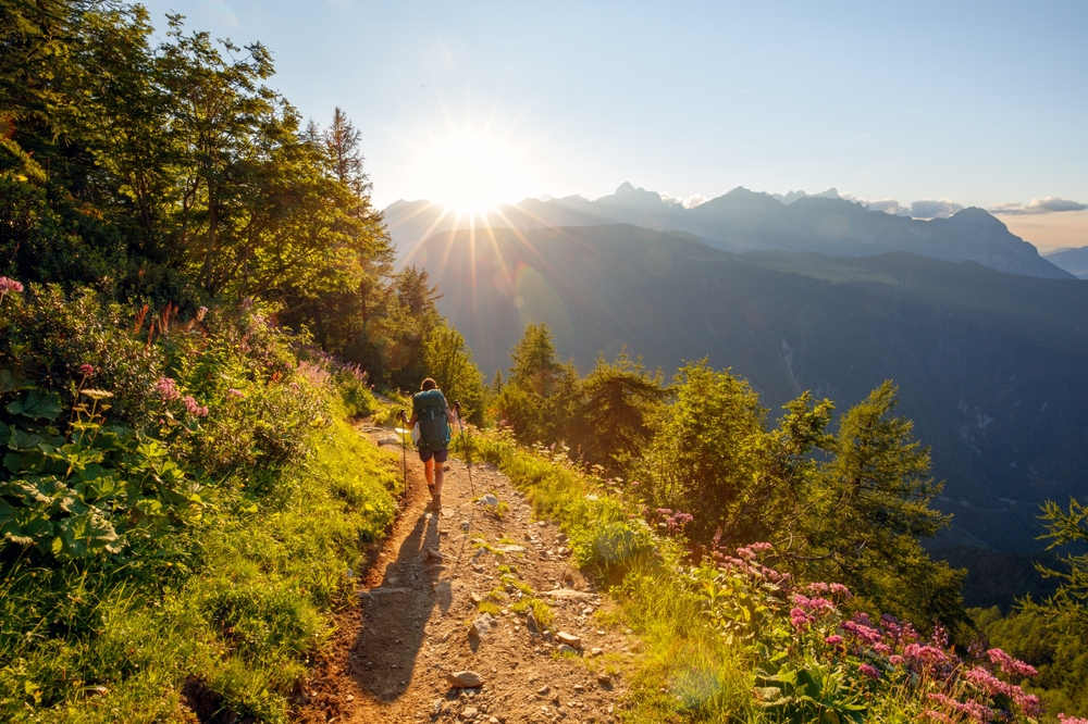 Person hiking mountain trail